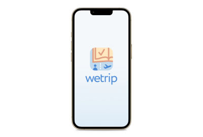 A mockup of a phone with an app start screen for the example WeTrip