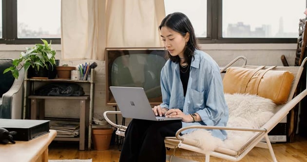 woman sitting at laptop